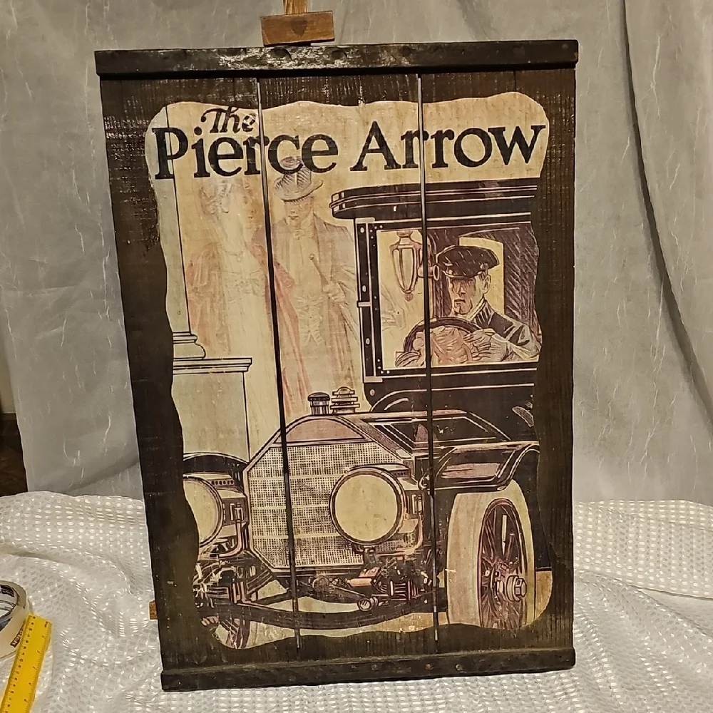 Vintage Pierce Arrow Car Advertisement On Rustic Wood